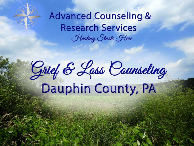 Serene Pennsylvania countryside path at golden hour symbolizing the journey through grief toward healing for Dauphin County, PA residents